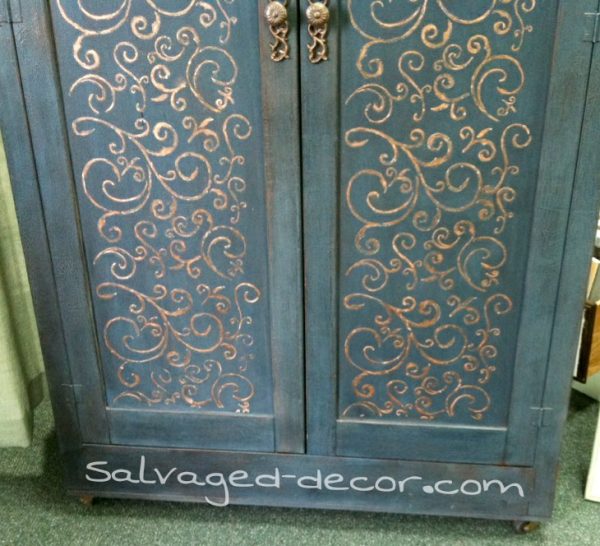 Repurposed cabinet using Miss Mustard Seed's Milk Paint in Curio and Artissimo with an added raised Stencil
